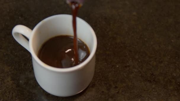 Pouring Hot Coffee White Cup Moka Pot Closeup Shot — Vídeos de Stock