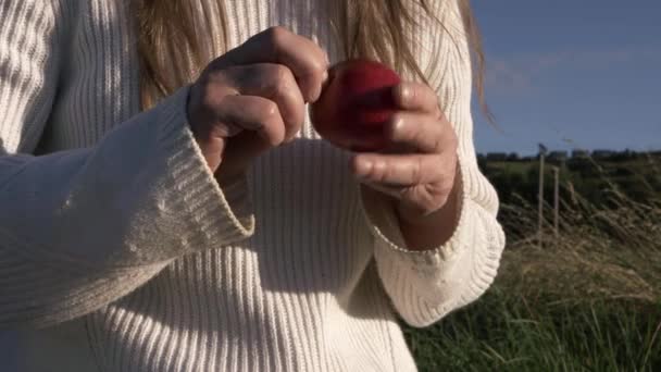 Woman Removing Stalk Juicy Red Apple Medium Shot — Vídeos de Stock