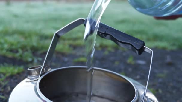 Filling Stainless Steel Camping Kettle Spring Water Closeup Shot — 图库视频影像
