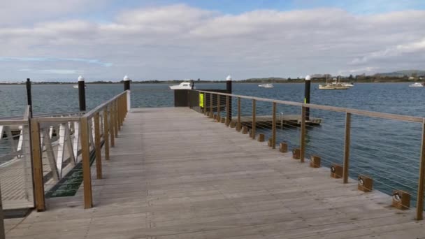 Empty Wooden Boardwalk Jetty View Yachts Boats Anchored Calm Sea — Stock Video