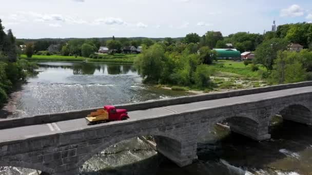 Vintage Pickup Truck Crosses Stone Arch Bridge Low Side Angle — Stok video