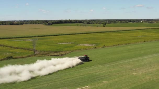 Farm Tractor Spreading White Powder Rotating Side View — Wideo stockowe