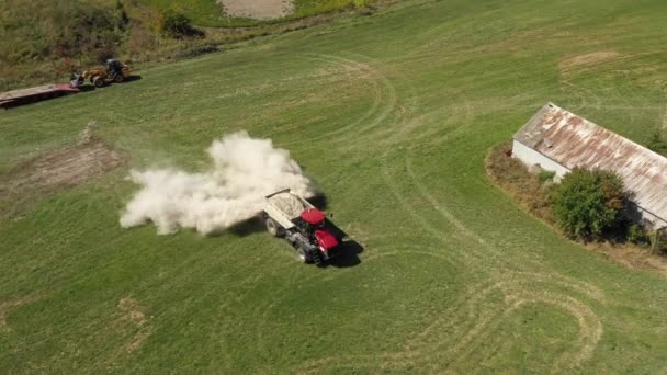 Farm Tractor Spreading White Powder Aerial — Stockvideo