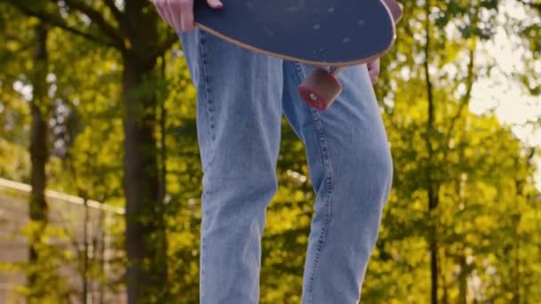 Girl Holding Skateboard Posing Laughing Flirting While Camera Slowly Goes — Stockvideo