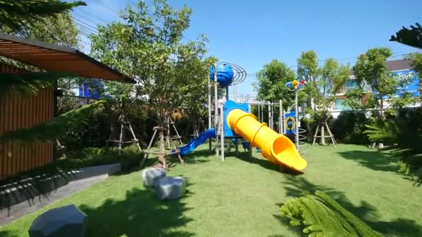 Colorful Children Playground Garden Sunny Day — Vídeo de stock