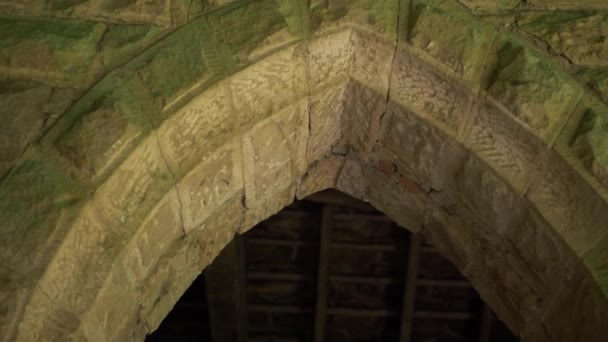 Arched Doorway Entrance Old Stone Building Medium Panning Shot — Stockvideo