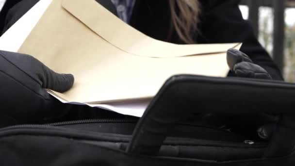 Business Woman Putting Documents Envelopes Briefcase Close Shot — Stockvideo