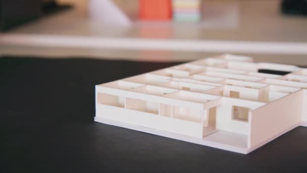Wooden Model Building Concept Sits Architects Black Desk Office Camera — Vídeo de Stock