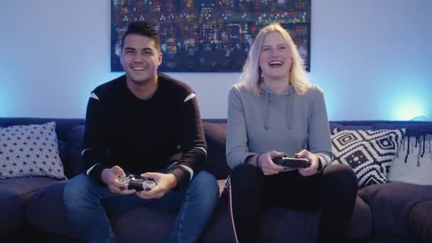 Young Couple Laughing Gaming Together Datenight Home — Stockvideo