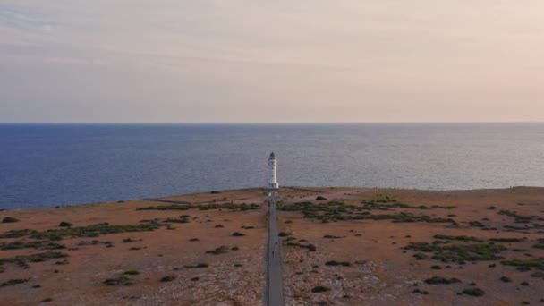 Lighthouse Cupola Dolly Empty Road Dry Plain Calm Blue Sea — Stock video