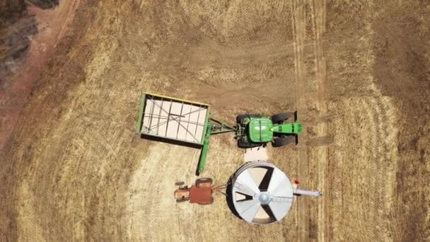 Tractor Pulls Grain Silo Unload Its Cargo Harvested Corn Aerial — Vídeo de stock