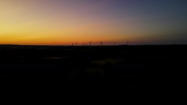 Aerial Shot Flying Wind Farm Golden Sunset Wind Turbines Silhouette — Stock video
