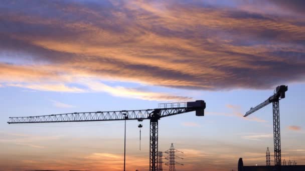 Clouds Soar Sky Sunset Two Construction Cranes — Stockvideo