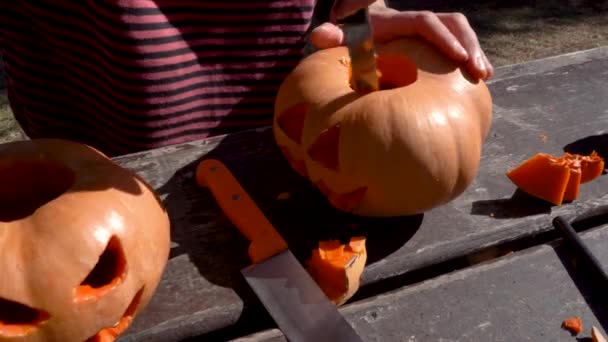 Woman Emptying Pumpkin Face Carved Prepared Halloween — Vídeos de Stock