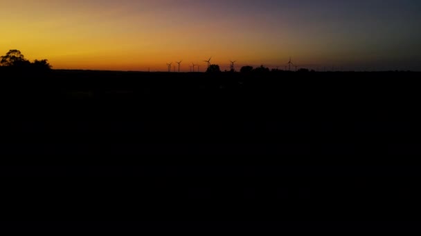 Wind Turbines Producing Green Energy Windmill Silhouettes Sunset Aerial — Stockvideo