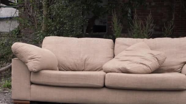 Couch Dumped Wasteland Medium Tilting Shot — Video