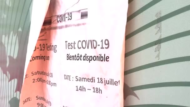 Pink Poster Covid Covid Coronavirus Test Site Written English French — 图库视频影像