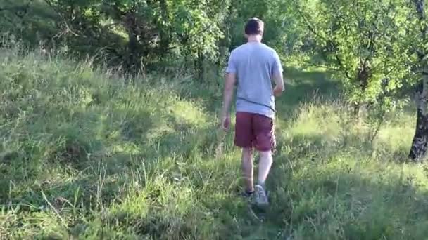 Man Walks Footpath Forest Daytime Summer Season Young Man Filmed — Video Stock