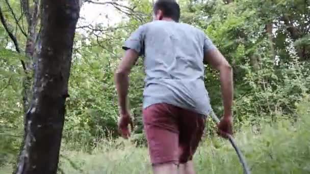 Man Walks Footpath Forest Daytime Summer Season Young Man Filmed — Video Stock