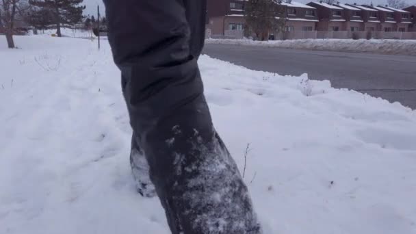 Child Walking Snow Wearing Snow Pants Snow Boots Gloves Urban — Stockvideo