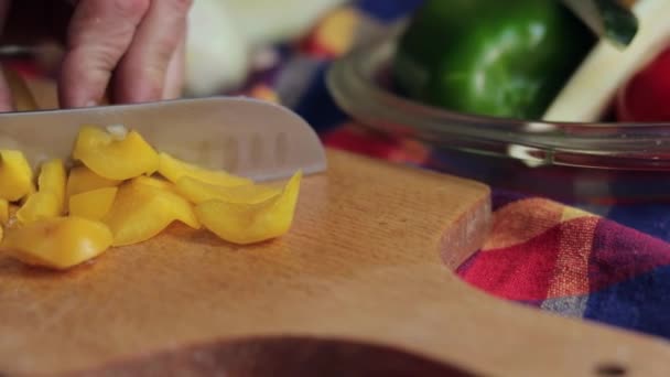 Close Shot Woman Hands Slicing Sweet Yellow Pepper Wooden Cutting — Video Stock