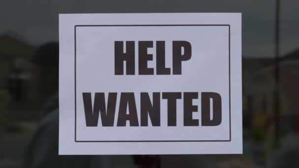 Help Wanted Sign Business While Person Passes Reflection — Vídeo de Stock