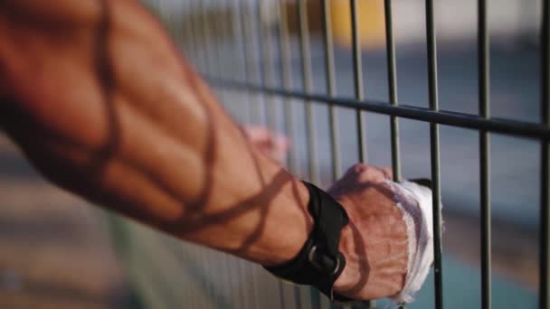 Portrait Caucasian Sports Man Leaning Urban Metal Fence While Rest — Vídeo de Stock