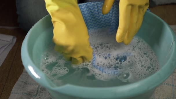 Hands Wearing Rubber Gloves Cloth Bowl Soapy Water Medium Shot — Vídeo de stock
