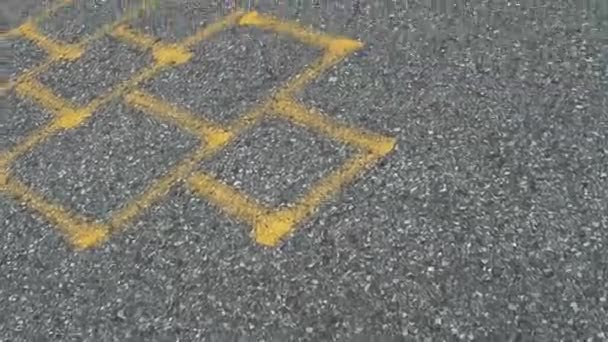 Hopscotch Game Set Out Yellow Paint Pavement Kids Play — Wideo stockowe