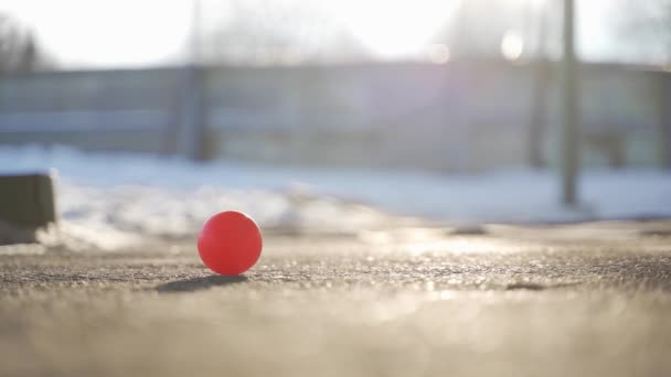 Small Red Ball Icy Pavement Winter — 图库视频影像