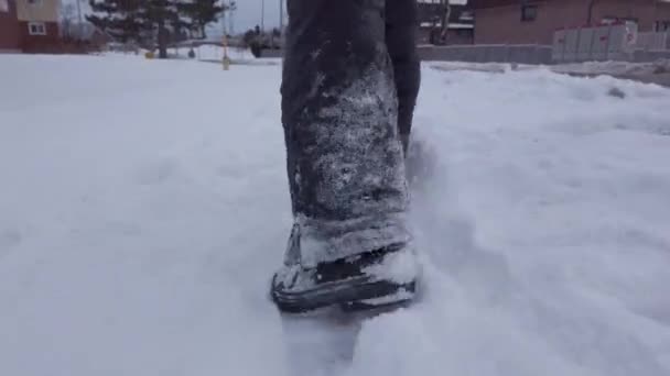 Young Boy Running Snow Side Road Wearing Grey Pants Red — Stock Video