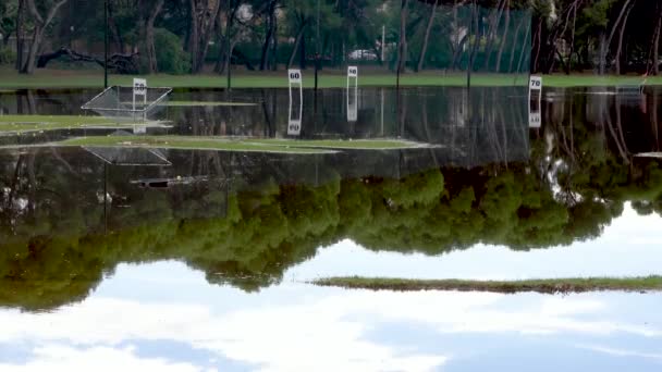 Golf Players Trying Score Balls 100 Flooded Driving Range — Wideo stockowe