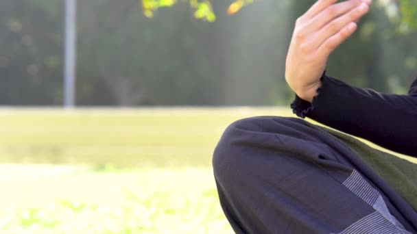 Woman Puts Hand Knee Lotus Position Practicing Yoga — Vídeo de Stock