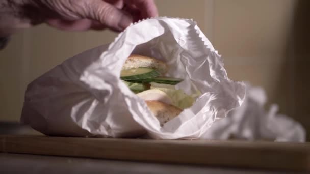 Elderly Lady Fresh Take Out Sandwich Bag Close Shot — Stockvideo