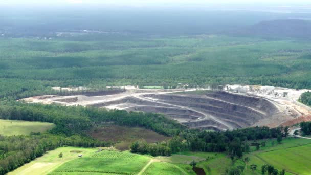 Operational Open Cut Mine Surrounded Lush Green Landscape Fixed Wide — Vídeo de stock