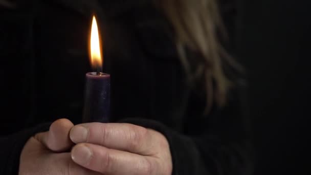 Woman Holding Long Candle Vigil Dark Background Medium Shot — Video Stock