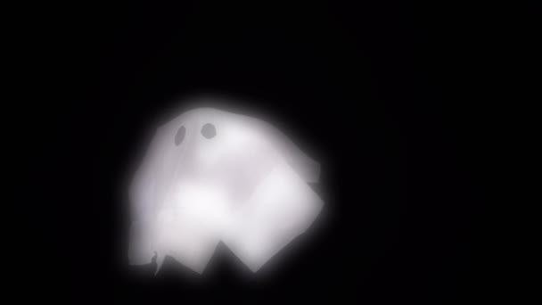 Halloween Glowing Ghost Puppet Floating Black Background — Video