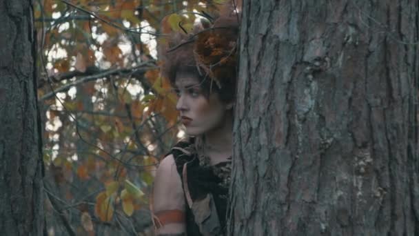 Beautiful Woman Hides Tree Trunk Forest Daytime Medium Shot Side — Stok Video