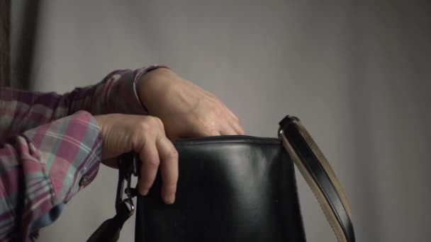 Woman Getting Cellphone Out Handbag Medium Shot — Wideo stockowe
