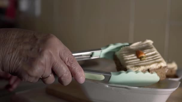 Hands Elderly Lady Serving Carrot Cake Close Shot — Stock video