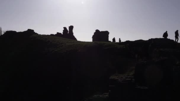 Group People Exploring Castle Ruins Dusk — Stockvideo