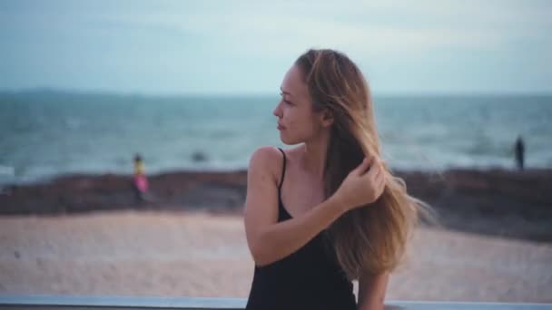 Portrait Blonde Caucasian Woman Beach Touching Her Hair Windy Day — Video Stock