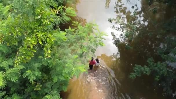 Lost Woman Female Child Walking Overflowed Road Surrounded Forest Trees — Stockvideo