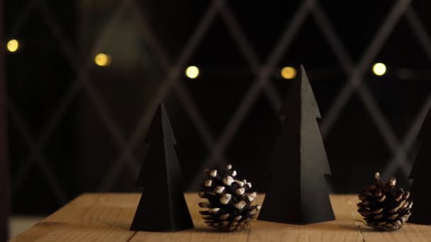 Handmade Christmas Decorations Pine Cones Bokeh Lights Background Slider Shot — Vídeo de Stock