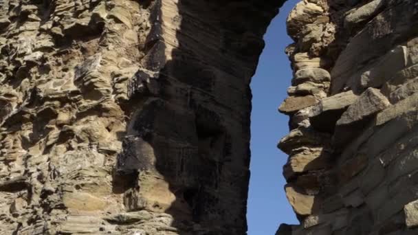 Castle Ruin Walls Archway Blue Sky Medium Panning Shot — стоковое видео