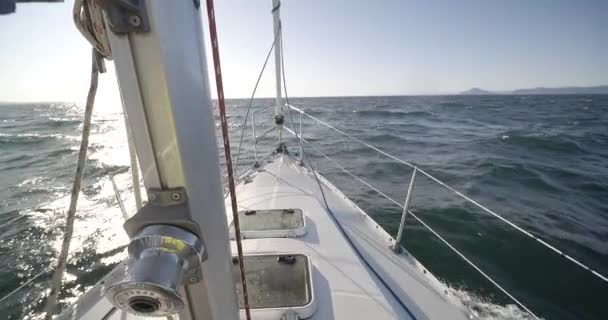 Sailboat Sailing Open Sea Bow Hitting Waves Sunny Day Slow — Vídeo de Stock