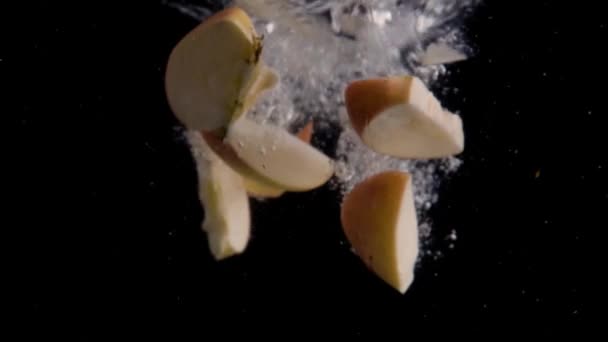 Apple Slices Falling Water Super Slowmotion Black Background Lots Air — Stock video