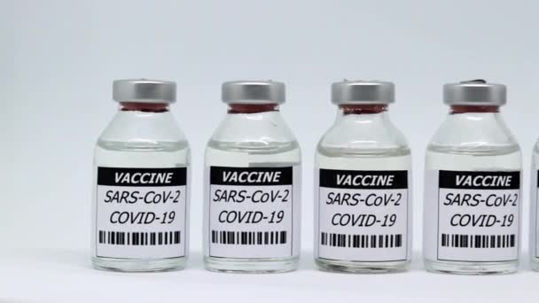 Row Covid Vaccine Glass Vials Isolated White Background Sars Cov — Αρχείο Βίντεο