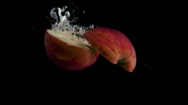 Apple Falling Water Super Slowmotion Black Background Lots Air Bubbles — ストック動画