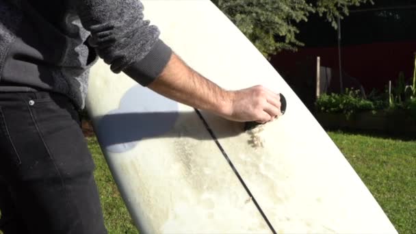 Surfer Removing Wax Board Home Garden — Video